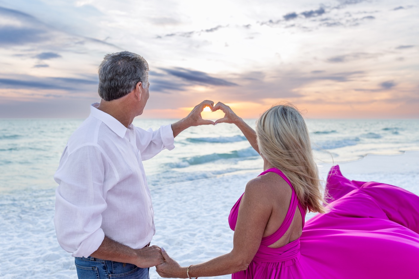 Sunset beach portrait with flying dress